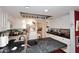 Bright kitchen boasts white cabinetry, dark countertops, and an island, perfect for culinary creations at 4317 N 70Th St, Scottsdale, AZ 85251
