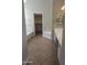 Bathroom with tile floors, double sink vanity and a door to a walk-in closet at 4581 E Apricot Ln, Gilbert, AZ 85298