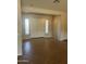 Spacious foyer with tile flooring and decorative glass block windows flanking the double front doors at 4581 E Apricot Ln, Gilbert, AZ 85298