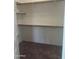 Empty walk-in closet with carpet and shelving at 4581 E Apricot Ln, Gilbert, AZ 85298
