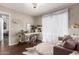 Bright bedroom features vanity, modern decor, and cozy seating area creating welcoming and stylish space at 5110 E Mark Ln, Cave Creek, AZ 85331