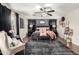 Luxurious main bedroom showcases plush bed, stylish decor, and elegant lighting creating serene retreat at 5110 E Mark Ln, Cave Creek, AZ 85331
