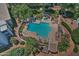 Bird's-eye view of pool with hot tub, lounge chairs, privacy walls, landscaping and patio area at 5203 N 24Th St # 207, Phoenix, AZ 85016