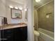 Bathroom featuring tile floors, vanity with granite countertop, and shower with curtain at 5203 N 24Th St # 207, Phoenix, AZ 85016