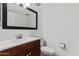 A clean, bright bathroom with modern fixtures, a sleek vanity, and a frameless mirror at 5203 N 24Th St # 207, Phoenix, AZ 85016