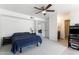 Spacious bedroom featuring a ceiling fan and neutral carpeting, creating a comfortable and inviting atmosphere at 5203 N 24Th St # 207, Phoenix, AZ 85016