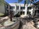 Charming courtyard featuring a water fountain, seating, and access to units via exterior staircases at 5203 N 24Th St # 207, Phoenix, AZ 85016