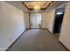 Dining room features a large chandelier and a glass door that leads to the exterior at 5203 N 24Th St # 207, Phoenix, AZ 85016