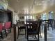Spacious dining room with modern track lighting and seating for large gatherings at 5203 N 24Th St # 207, Phoenix, AZ 85016