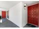 A walkway to a front door of a unit with a visible unit number on the wall above at 5203 N 24Th St # 207, Phoenix, AZ 85016