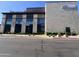 Modern exterior showcases large windows and architectural stone accents, complemented by manicured landscaping at 5203 N 24Th St # 207, Phoenix, AZ 85016