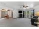 Spacious living room with ample natural light, neutral carpet, and a view to the outdoors at 5203 N 24Th St # 207, Phoenix, AZ 85016