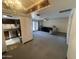 Spacious living room featuring recessed lights and an entry to the kitchen and dining area at 5203 N 24Th St # 207, Phoenix, AZ 85016