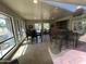 Comfortable community lounge area with large windows and dining tables creates a welcoming atmosphere for residents to gather at 5203 N 24Th St # 207, Phoenix, AZ 85016