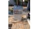 Outdoor grill area showcasing a modern grill setup near a pond at 5203 N 24Th St # 207, Phoenix, AZ 85016