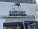 An image of Zinburger Wine & Burger Bar's sign with a cow and text at 5203 N 24Th St # 207, Phoenix, AZ 85016