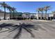 Restaurants with shaded outdoor seating surrounded by palm trees in a commercial retail location at 5203 N 24Th St # 207, Phoenix, AZ 85016