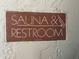 Directional sign for the sauna and restroom amenities at 5203 N 24Th St # 207, Phoenix, AZ 85016