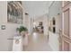 Welcoming foyer featuring tiled floors, arched doorways, and stylish decor at 6080 S Jojoba Ct, Gold Canyon, AZ 85118