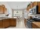 Open-concept kitchen with eat-in breakfast area and modern appliances at 6080 S Jojoba Ct, Gold Canyon, AZ 85118