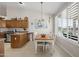 Bright eat-in kitchen featuring stainless steel appliances and large windows at 6080 S Jojoba Ct, Gold Canyon, AZ 85118