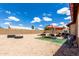 Spacious backyard with a patio, furniture, and clear skies at 6302 E Portia St, Mesa, AZ 85215