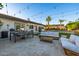 Beautiful backyard patio with outdoor dining, seating area, and view of the pool at 7821 N Via De La Sombre --, Scottsdale, AZ 85258