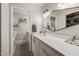 Neutral bathroom featuring quartz countertops, white cabinets, gold hardware, and modern fixtures at 7821 N Via De La Sombre --, Scottsdale, AZ 85258