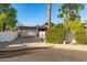 Home exterior with attached garage, tile roof, and desert landscaping at 7821 N Via De La Sombre --, Scottsdale, AZ 85258