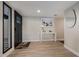 Inviting foyer featuring wood look flooring, stylish decor, and a contemporary design at 7821 N Via De La Sombre --, Scottsdale, AZ 85258