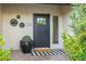 Close-up view of the property's front door, showing the address number and decorative planters at 7821 N Via De La Sombre --, Scottsdale, AZ 85258