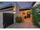 Exterior front entrance with desert landscaping, address number, and secure gate at 7821 N Via De La Sombre --, Scottsdale, AZ 85258