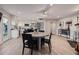 Open-concept living area with dining table, modern lighting, and view of the kitchen at 7821 N Via De La Sombre --, Scottsdale, AZ 85258