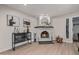 Cozy living room features a fireplace, stylish bar and contemporary decor at 7821 N Via De La Sombre --, Scottsdale, AZ 85258