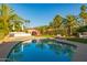 Stunning pool area with a sunbed, lush greenery, and ample patio for relaxation and entertaining at 7821 N Via De La Sombre --, Scottsdale, AZ 85258