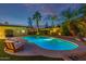 Sparkling pool with ample seating surrounded by mature trees for a private oasis at 7821 N Via De La Sombre --, Scottsdale, AZ 85258