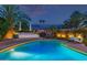 Beautiful pool area with lounge chairs and tropical landscaping, perfect for relaxation at 7821 N Via De La Sombre --, Scottsdale, AZ 85258