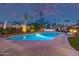 Sparkling pool surrounded by mature landscaping and a lounge area creating a backyard oasis at 7821 N Via De La Sombre --, Scottsdale, AZ 85258