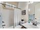 Bathroom featuring a shower and tub combination with neutral tones and modern fixtures at 8633 E Kael Cir, Mesa, AZ 85207