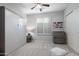 Bedroom with neutral tones, shutters, and an abundance of closet space at 8633 E Kael Cir, Mesa, AZ 85207