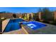 Backyard featuring a pool and spa, offering a private and luxurious outdoor living space at 8633 E Kael Cir, Mesa, AZ 85207