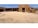 Construction site with the wooden frame of a modern building under construction, with desert landscape at 9002 E Havasupai Dr, Scottsdale, AZ 85255