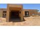 New home construction with exposed framing, showcasing modern architectural details and design elements at 9002 E Havasupai Dr, Scottsdale, AZ 85255