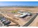Aerial view of a local school, sports field, and surrounding desert neighborhood at 948 E Wiley Way, Casa Grande, AZ 85122