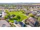 Aerial view of a well-maintained community park with lush green lawns and walking trails at 948 E Wiley Way, Casa Grande, AZ 85122