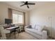 Bedroom with a musical setup, neutral colors, carpet, and a ceiling fan at 948 E Wiley Way, Casa Grande, AZ 85122
