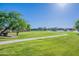 Community park features a walking trail, lush landscaping and well-manicured grass at 948 E Wiley Way, Casa Grande, AZ 85122