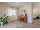 The living room has neutral paint, recessed lighting, and tile flooring. Piano room adjacent at 948 E Wiley Way, Casa Grande, AZ 85122