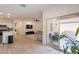 Open-concept living space seamlessly connects kitchen, living, and outdoor patio at 948 E Wiley Way, Casa Grande, AZ 85122