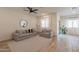 The living room has neutral paint, recessed lighting, a ceiling fan and tile flooring at 948 E Wiley Way, Casa Grande, AZ 85122